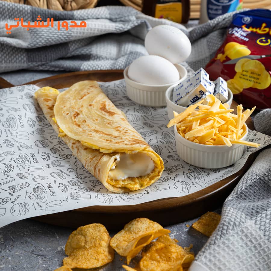 Fresh shabati with egg and liquid cheese from Modawar Al-Shabati