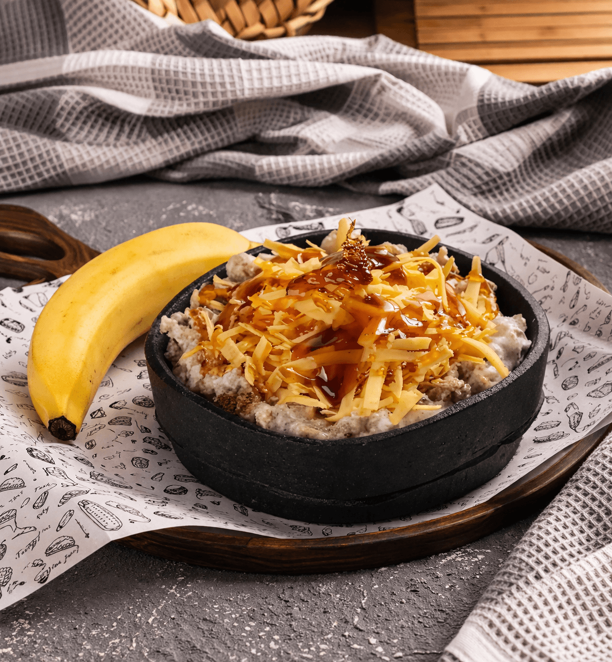 Premium masoub with banana and cream from Modawar Al-Shabati